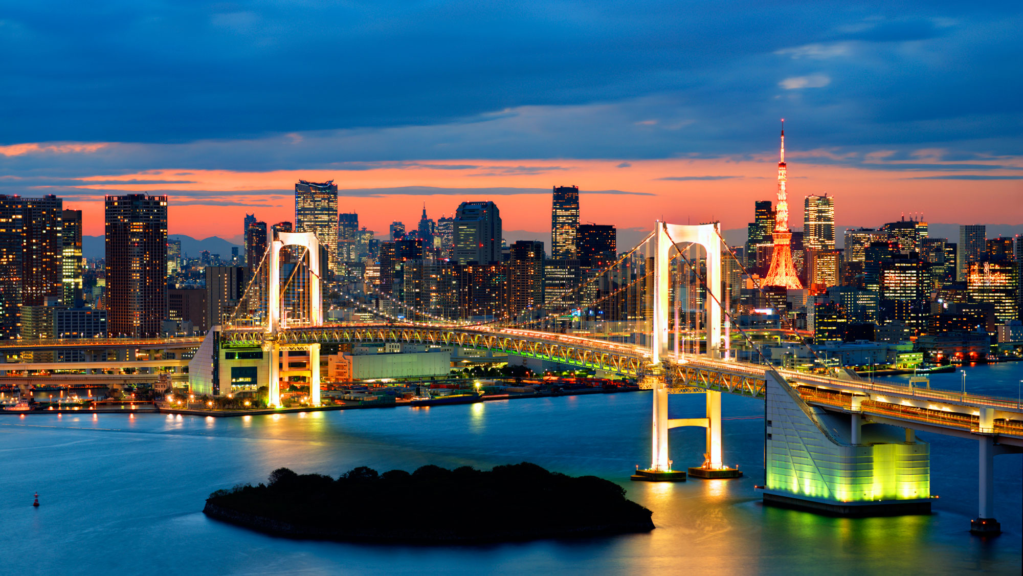 sunset bridge with city